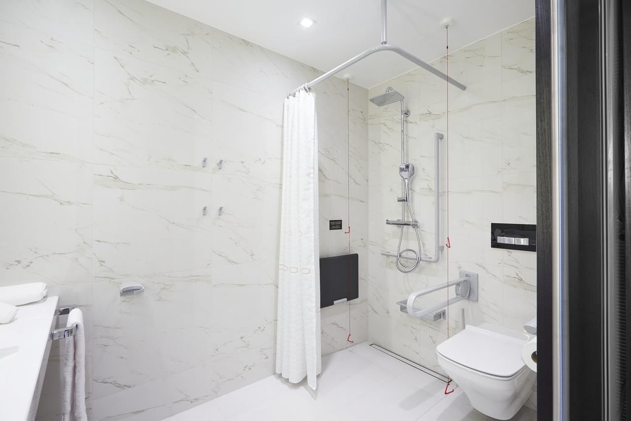 Отель Hilton Tallinn Park Таллин